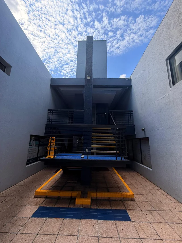 Courtyard staircase with yellow step edges